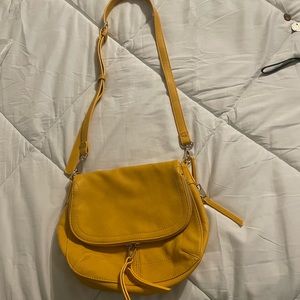 Super cute yellow cross body bag.  Excellent used condition